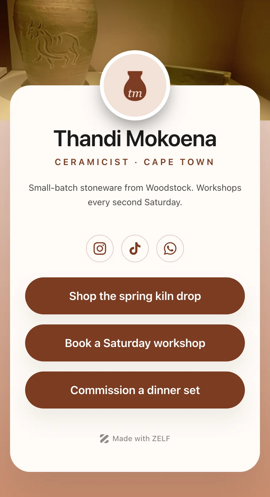 A freelancer ZELF page for the fictional ceramicist Thandi Mokoena, with a bio, social icons and three link buttons.